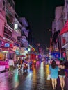 Ho Chi Minh City, Vietnam - A crowd of people move along Bui Vien Street , a popular nightlife district lined with