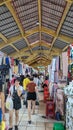 Ho Chi Minh City, Vietnam - A typical aisle filled with ladies clothes and accessories Inside Ben Thanh Market