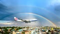 China Airlines Boeing 747 Cargo fly over urban areas with rainbow behind sky prepare landing Tan Son Nhat International Airport