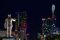 Ho Chi Minh statue on night city background