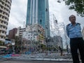 Ho Chi Minh, Vietnam - December 17,2019 : Asian male Security gaurd watching over workers