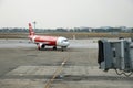 Ho Chi Minh,Vietnam, MARCH 30,2019 : An Air Asia (low-cost airline) aircraft approaches the passenger terminal Royalty Free Stock Photo