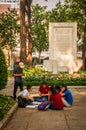Ho Chi Minh, Vietnam - November 13, 2013: Group of students learn to speak English with English native foreigners at