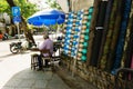 Ho Chi Minh, Vietnam - November 20, 2017: old man working with sewing machine in street Royalty Free Stock Photo