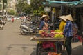 Local Vietnamese people walking on the street near Hoa Binh Market in Ho Chi Minh City, Vietnam Royalty Free Stock Photo