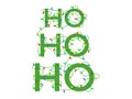 Ho ho ho, Merry Christmas. Text braided with Christmas glowing garland. Holiday lights are red, blue, yellow and green. Christmas Royalty Free Stock Photo