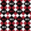 Ho ho ho text with paw prints and check plaid pattern Royalty Free Stock Photo