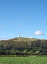 Hoad hill an historic 19th century monument in Ulverston with surrounding trees and fields