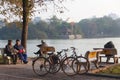 Hoan Kiem Lake Hanoi Vietnam 20/12/2013 old men sitting and relaxing and reading