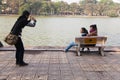 Hoan Kiem Lake Hanoi Vietnam 20/12/2013 young people relaxing and photographing