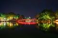 Hoan Kiem lake at night with old The Huc bridge on national celebration day