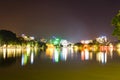 Hoan Kiem lake view at night with Ngoc Son old temple and The Huc bridge