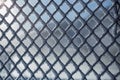 Hoar frost on the metal mesh fence at winter Royalty Free Stock Photo