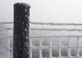 Hoar frost on wire fence and post Royalty Free Stock Photo