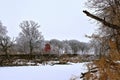 Hoarfrost with old red barn in the background Royalty Free Stock Photo