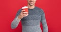 hoary man drinking coffee. male fashion model hold cup. winter fashion. morning coffee.