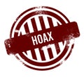 Hoax - red round grunge button, stamp