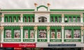 Hobart, Tasmania, Australia - December 14, 2009: Iconic T.J. Cane building in Elizabeth street is painted grass green with golden