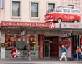 Hobart, Tasmania, Australia - December 14, 2009: Red Herring VW van on display above two stores in Liverpool Shopping Street, one Royalty Free Stock Photo