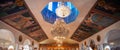 Interior of the Greek Orthodox church of St George the Matyr, showing chandelier centrepiece Royalty Free Stock Photo