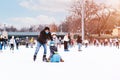 Hobbies and Leisure.Winter sports.Family winter sport.Holiday and seasonal concept.Activity,Adult,Child,Childhood