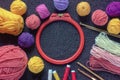 Hobby concept. Embroidery frame, colorful balls of wool, knitting needles. Copy space Royalty Free Stock Photo
