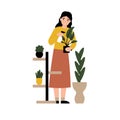 Hobby concept, girl spraying water home flowers