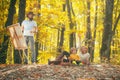 Hobby concept. Painter artist with family relaxing in forest. Painting in nature. Start new picture. Beauty of nature Royalty Free Stock Photo