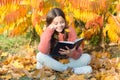 Hobby and interests. Child enjoy reading. Schoolgirl study. Study every day. Girl read book autumn day. Little child Royalty Free Stock Photo