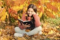 Hobby and interests. Child enjoy reading. Schoolgirl study. Study every day. Girl read book autumn day. Little child Royalty Free Stock Photo