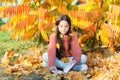 Hobby and interests. Girl read book autumn day. Little child enjoy learning at backyard or park. Kid study with book Royalty Free Stock Photo