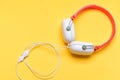 Hobby, leisure and music concept. Headphones in white and red