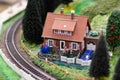 Hobby model of a rural brown house at the railway.
