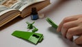 Hobbyist is assembling an plastic model of airplane