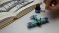 Hobbyist is repairing an plastic airplane model