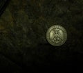 Hobo coin Baphomet Satanic symbolism with black background Royalty Free Stock Photo