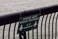 Hoboken, United States - April 19th, 2020 - Sign on the Hoboken Waterfront outlines the new social distancing guidelines