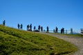 Tourists looking to the view from Hohe Salve mountain Royalty Free Stock Photo