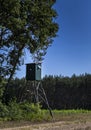 High stand for the hunter in a glade in the forest Royalty Free Stock Photo