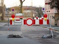 Hochwasser (Flood) Sign at a Barrier in Germany