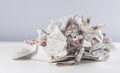 Pile of shopping receipts on white table