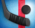 Hockey black stick and puck on ice Royalty Free Stock Photo