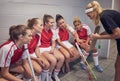 Hockey, girl team and coach with strategy, sports game and teamwork with coaching and planning for game. Fitness