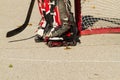 A hockey goalie waiting for play to resume Royalty Free Stock Photo