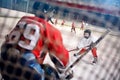 Hockey match at rink player attacks goalkeeper Royalty Free Stock Photo