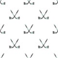 Hockey pattern with crossed sticks on a white background. Endless vector illustration. Royalty Free Stock Photo