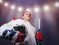 Hockey player with helmet in hands : moment of glory