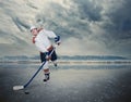 Hockey player on the ice lake surface