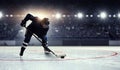 Hockey player on ice . Mixed media Royalty Free Stock Photo