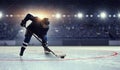 Hockey player on ice . Mixed media Royalty Free Stock Photo